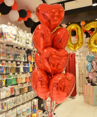 Bouquet de 8 ballons cœur rouge à l’hélium