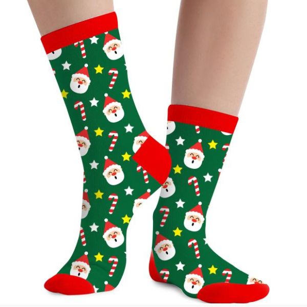 chaussettes de Noël vertes avec motifs Père Noël et cannes à sucre