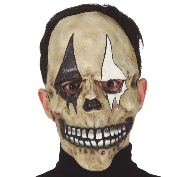 Masque Halloween clown squelette en latex avec sourire macabre et détails réalistes.