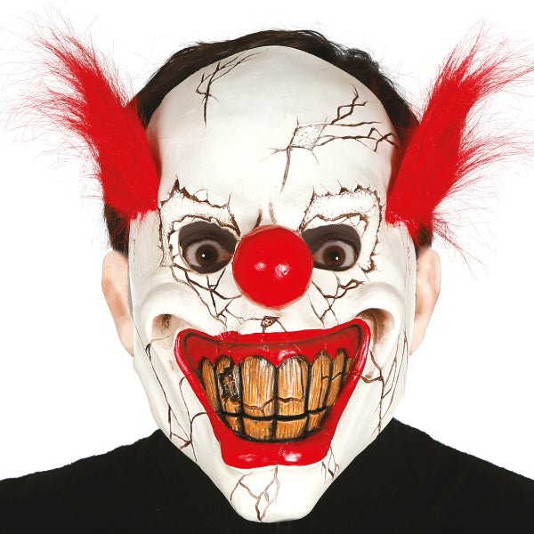 Masque Halloween clown tueur en latex avec sourire terrifiant et cheveux rouges